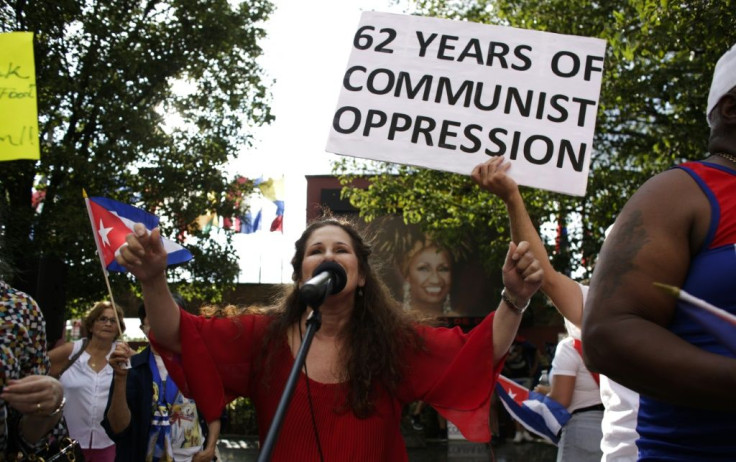 A woman speaks to the crowd during a protest showing support for Cubans demonstrating against their government, in Union City, New Jersey, on July 18, 2021