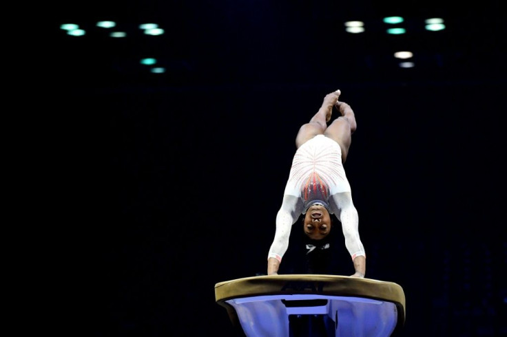 Biles landing the first ever Yurchenko double pike by a woman in Indiana in May