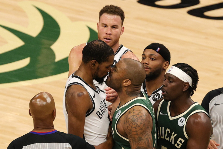 Kevin Durant #7 of the Brooklyn Nets and P.J. Tucker #17 of the Milwaukee Bucks