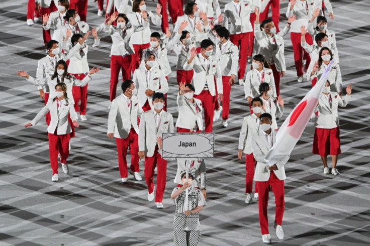 As the host nation, the Japanese team paraded last into the stadium