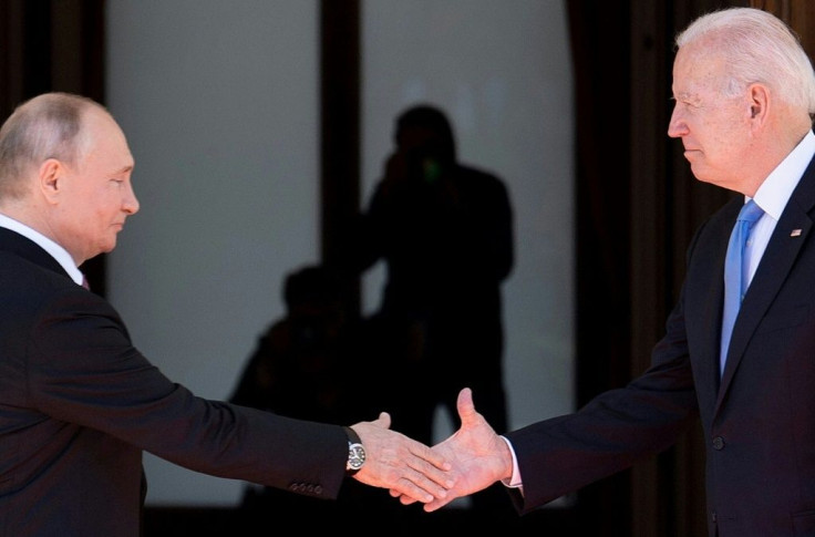 Russian President Vladimir Putin shakes hands with US President Joe Biden at a summit in Geneva on June 16, 2021