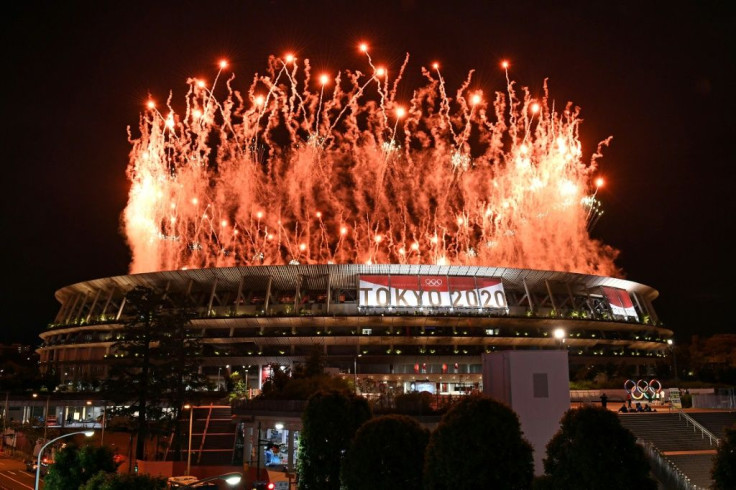 Fireworks light up the sky over the Olympic Stadium during the opening ceremony of the Tokyo 2020 Games