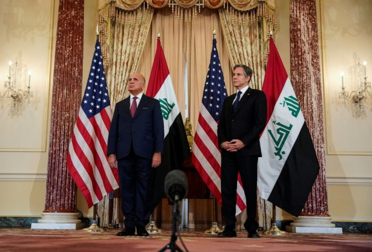 US Secretary of State Antony Blinken and Iraqi Foreign Minister Fuad Hussein speak to the press at the State Department