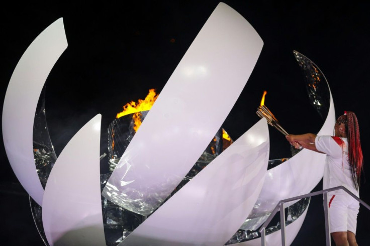 Naomi Osaka lit the Olympic cauldron as the Games officially opened