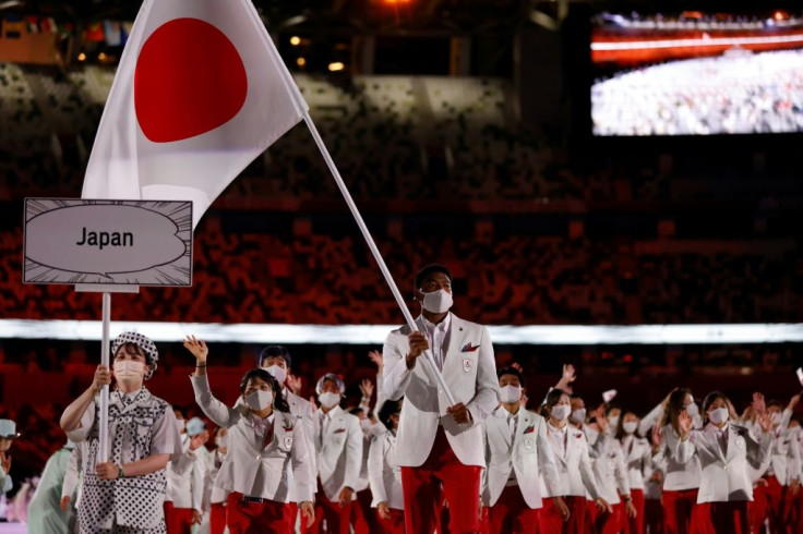 Basketball star Rui Hachimura carried in Japan's flag