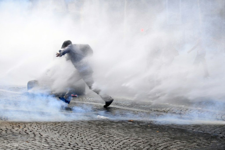 In France police deployed teargas and water cannon against some protesters