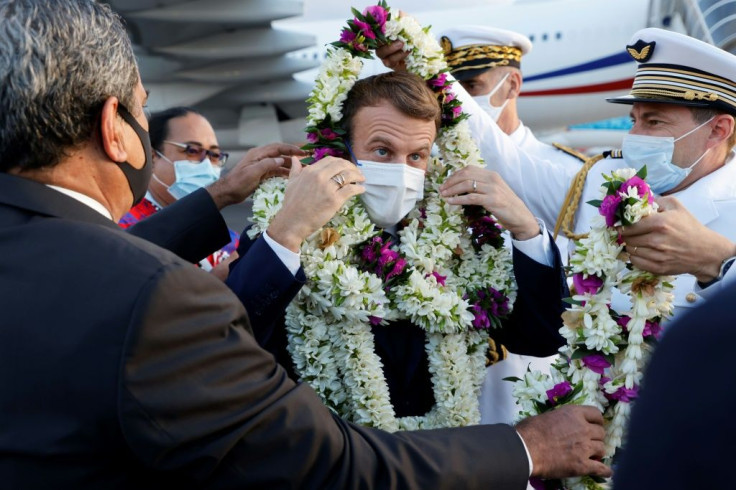 President Emmanuel Macron (C) is making his first official trip to French Polynesia