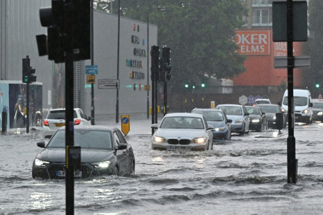 The Met Office issued an amber weather warning and said there was a risk of lightning strikes and flooding