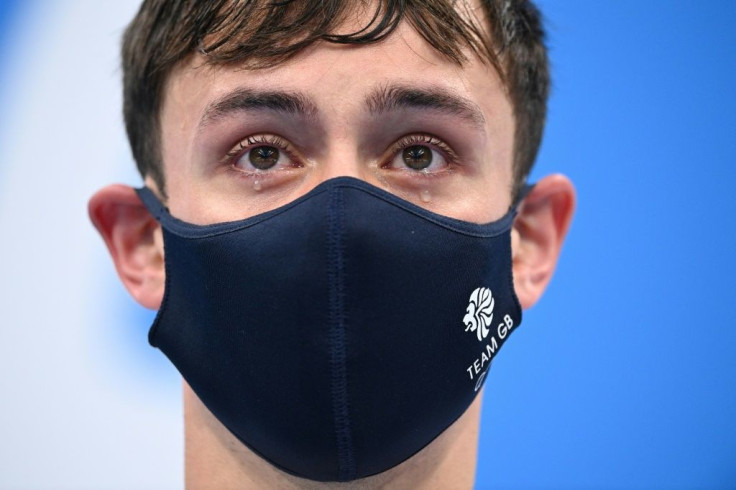 Britain's Tom Daley has crowned his diving career with an Olympic gold medal