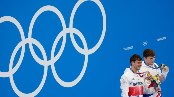 Britain's Tom Daley (left) and Matty Lee celebrate their diving gold medal at Tokyo 2020