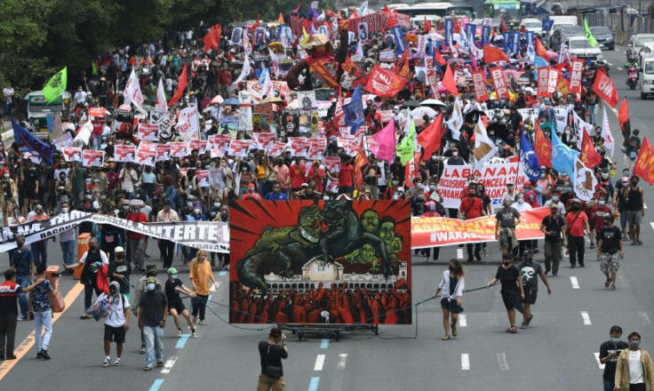 Thousands of protesters marched along a major avenue demanding an end to Duterte's presidency
