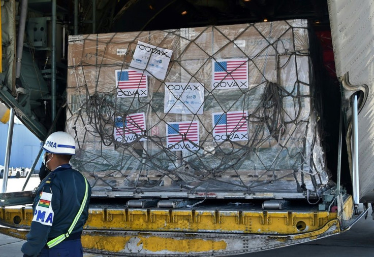 Boxes containing doses of US Johnson & Johnson Covid vaccines donated through the COVAX mechanism arrive in Bolivia