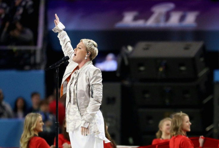 Pink singing the US national anthem at the Super Bowl in February 2018 in Minneapolis, Minnesota: she has offered to pay the fines slapped on the Norwegian women's beach handball team for wearing shorts instead of bikinis during a championship match