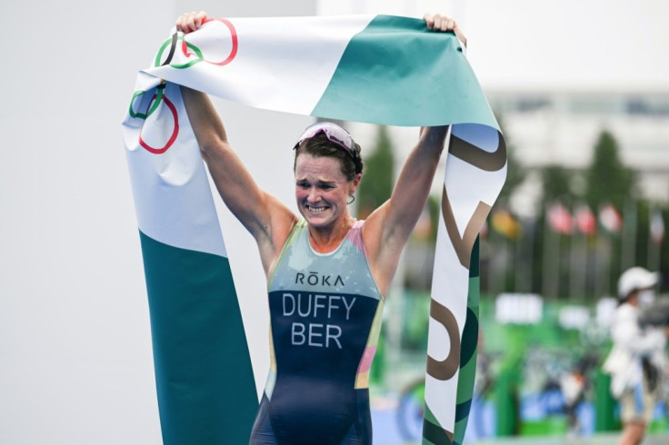 Bermuda's Flora Duffy celebrates winning the women's triathlon at the Tokyo Olympics