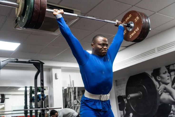 Cyrille Tchatchet II, training in a gym at Middlesex University in north London, was reduced to living under a bridge in his early days in England