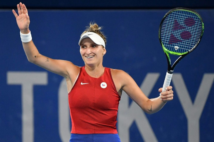 Marketa Vondrousova celebrates her win over Naomi Osaka