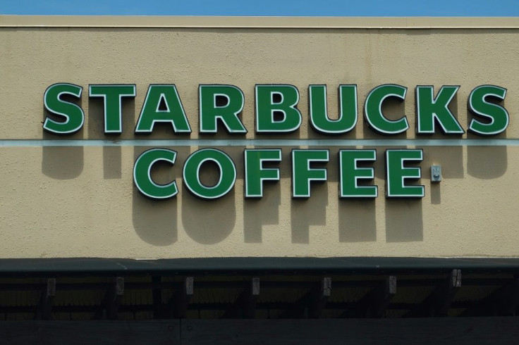 Surging sales helped Starbucks score stronger than expected profits after reporting a loss in the year-ago period