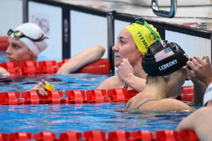 Australia's Ariarne Titmus (C), nicknamed "Terminator", toppled 2016 champion USA's Kathleen Ledecky (R) in a thrilling 400m freestyle race