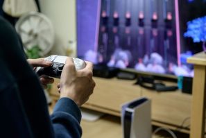 A gamer plays on the new Sony Playstation PS5 at his home in Seoul in November 2020 shortly after the coveted console was launched