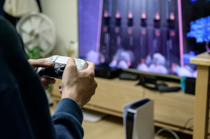 A gamer plays on the new Sony Playstation PS5 at his home in Seoul in November 2020 shortly after the coveted console was launched