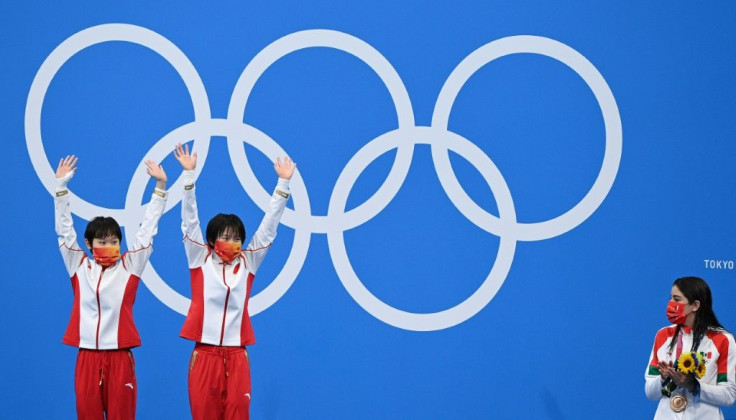 Teenagers Chen Yuxi and Zhang Jiaqi showed no nerves in winning another diving gold for China in Tokyo