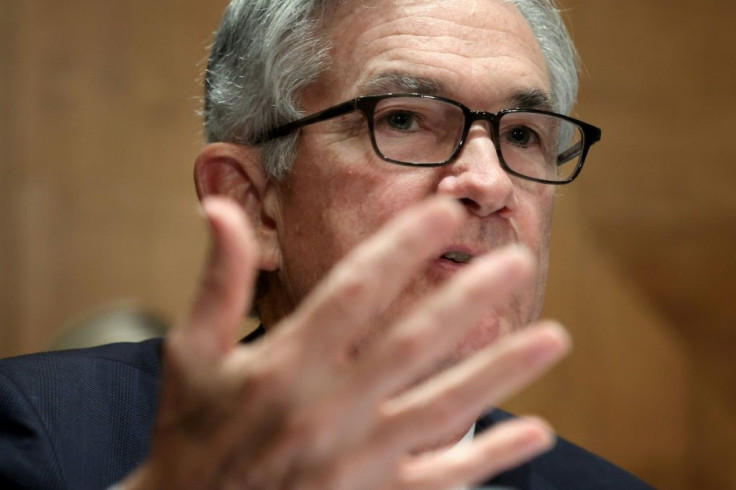 US Federal Reserve boss Jerome Powell said that while the world's top economy was well on the recovery track, it was too early to begin removing monetary policy support just yet
