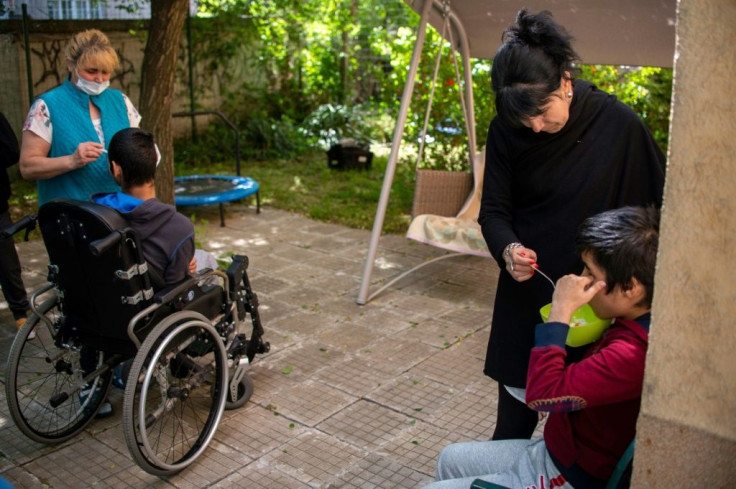 Bulgaria has been shutting its dozens of large care homes for abandoned children, moving them to smaller family-like homes such as this one in Sofia