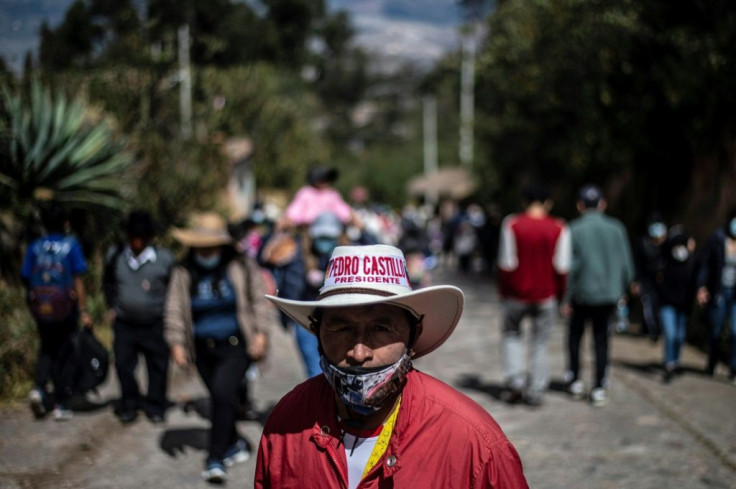 Supporters of Peruvian President Pedro Castillo attended a ceremony at the Pampa de la Quinua where the new prime minister, Guido Bellido, was sworn in