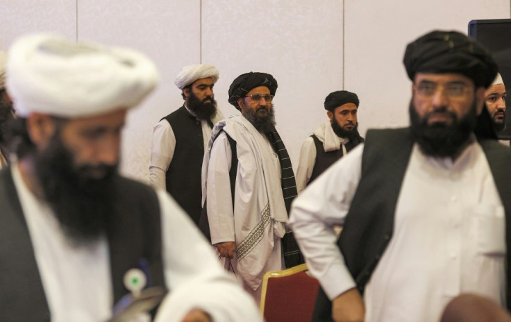 Taliban negotiators in Qatar: over two decades US experts say the Islamist insurgents, though often poorly equipped, have shown greater determination to fight than government forces