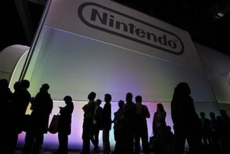 Attendees wait in line to see the new Nintendo Wii U controller during the Electronic Entertainment Expo, or E3, in Los Angeles June 7, 2011.