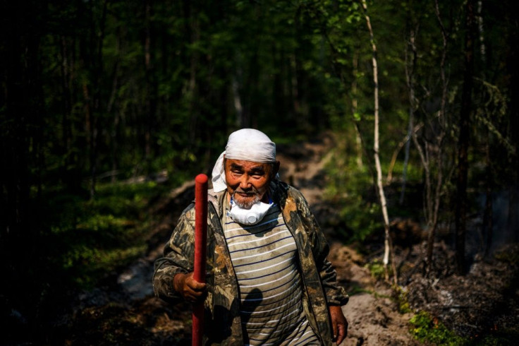 "I've lived my whole life in the taiga. I'm dependent on nature," 65-year-old Ivan Fyodorov says as he helps fight a fire near his land. "We have to protect it."