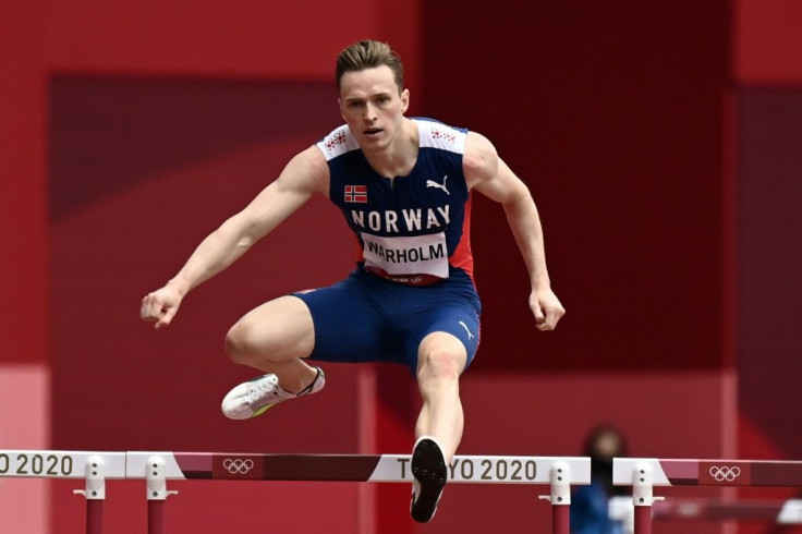 Norway's Karsten Warholm competes in the men's 400m hurdles heats
