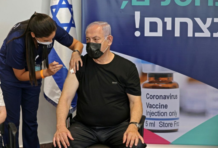 Former Israeli prime minister Benjamin Netanyahu receives a third dose of the Pfizer/BioNTech Covid-19 vaccine in Tel Aviv