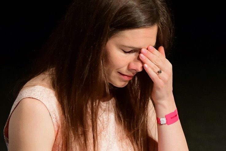 Amanda Knox reacts after she addressed a panel discussion titled "Trial by Media" during the Criminal Justice Festival at the Law University of Modena, northern Italy on June 15, 2019
