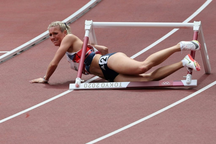 Britain's Jessie Knight's 400 metres hurdles Olympic campaign lasted seconds as she lost balance and stumbled into the first obstacle leaving the track in floods of tears