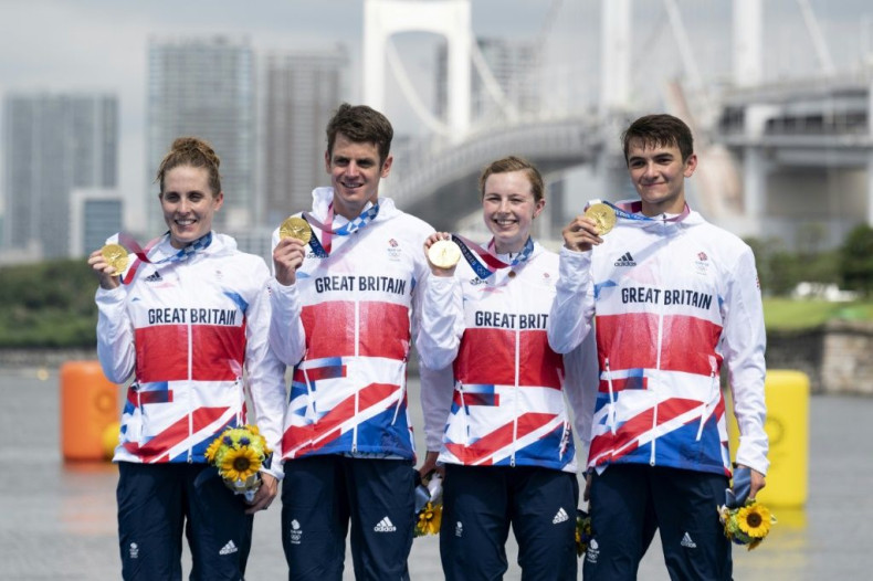 Jonathan Brownlee (second left) finally won a triathlon gold after winning the mixed race with Alex Yee, Georgia Taylor-Brown and Jessica Learmonth