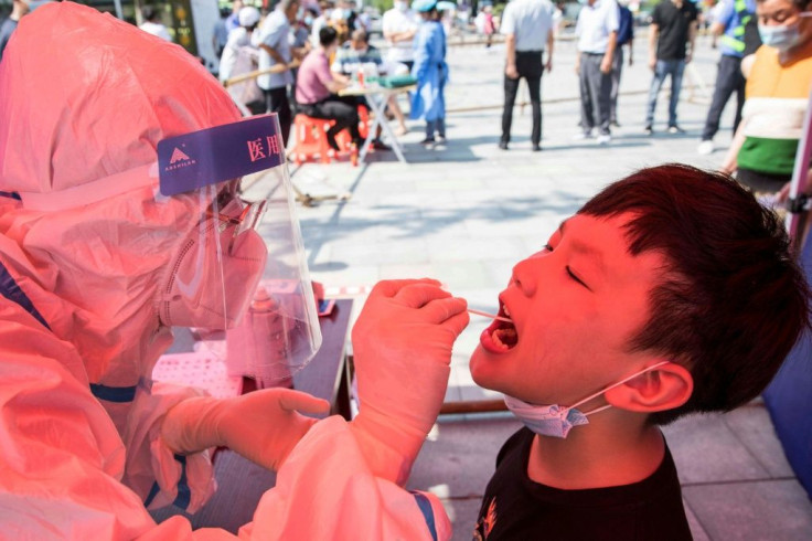 Chinaâs worst surge of coronavirus infections in months spread to two more areas