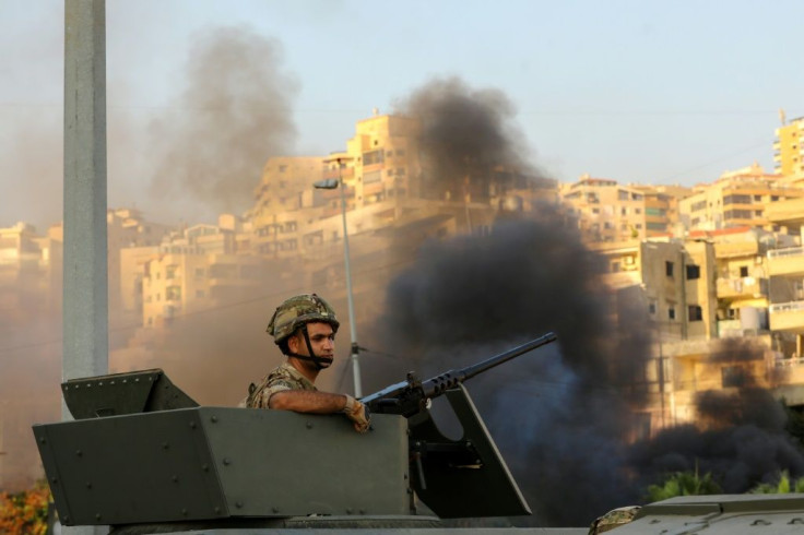 Military checkpoints backed by armoured vehicles were erected at various road crossings leading to Khalde