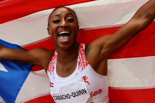 Puerto Rico's Jasmine Camacho-Quinn celebrates winning an Olympic gold medal in the women's 100m hurdles