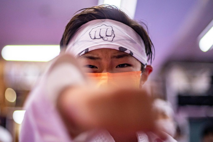 A student practises karate at a dojo in Tokyo