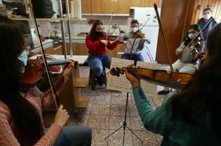 Venezuelan musicians from the Latin Vox Machine rehearse The Symphonic Little Prince in a house in Buenos Aires