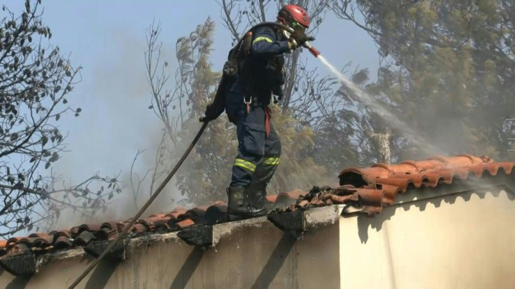 A total of 141 firefighters have been mobilised to contain a forest blaze at the base of Mount Penteli north of Athens. The fire service are backed by 10 helicopters and eight firefighting planes, but said strong winds were complicating operations.