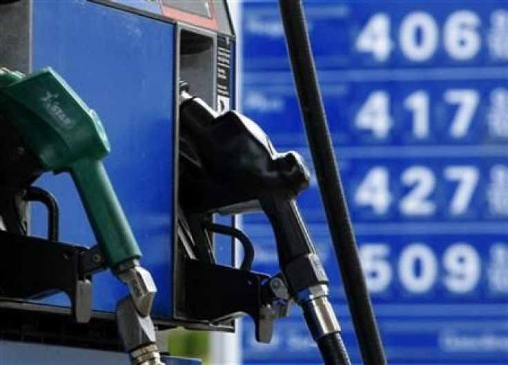 Petrol and diesel pumps along with gas prices are shown at an Exxon petrol station in Carlsbad