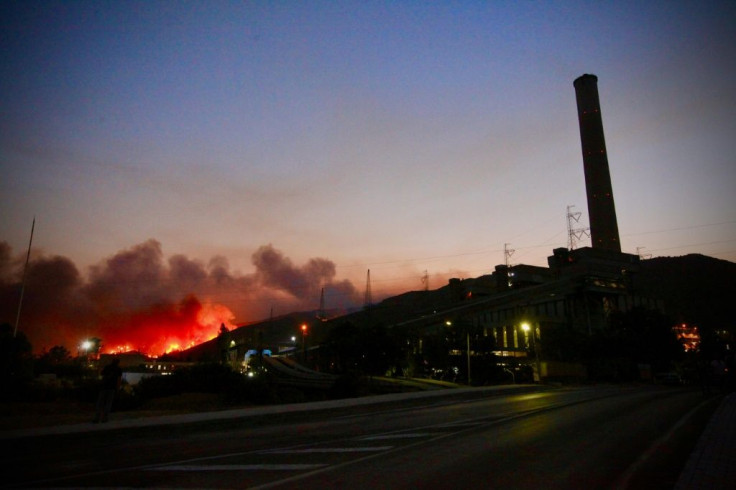 Flames soar close to a  power Plant near Oren, in Turkey's Mugla holiday region