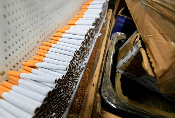 The cigarette packing machine worked day and night to produce million of smokes for the British market