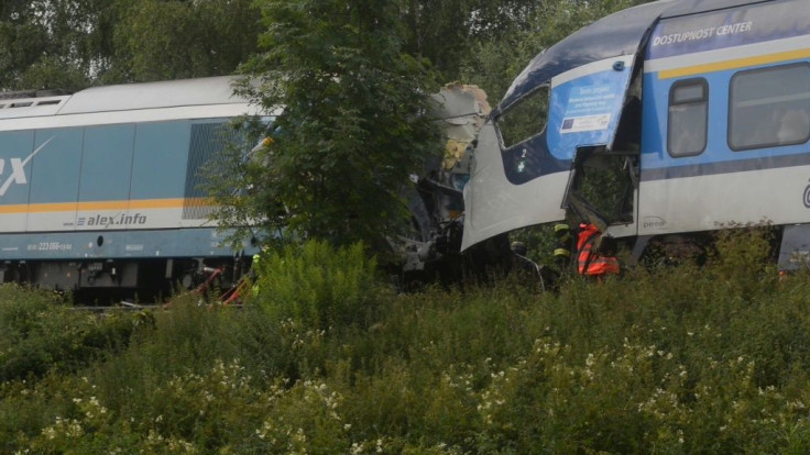 At least three people died and dozens more were injured when two trains collided at a village in the west of the Czech Republic