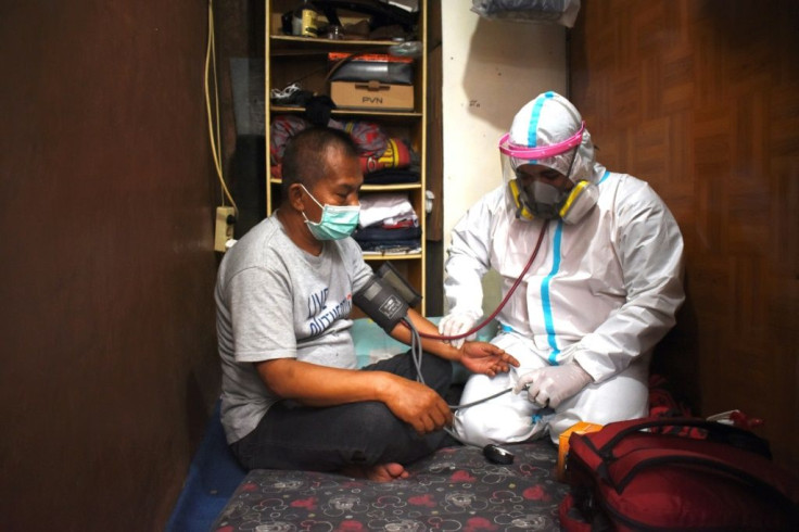Health care facilities are stretched to the limit in Indonesia as the death toll soars