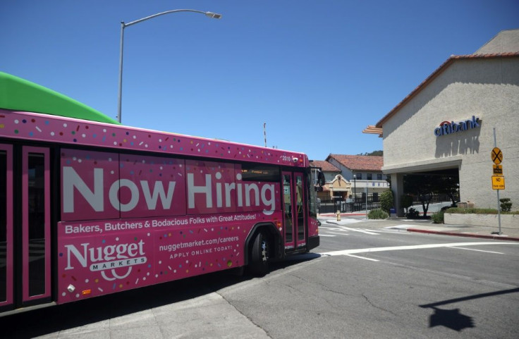 US private firms added just 330,000 jobs in July, less than half the gain in June, according to ADP data