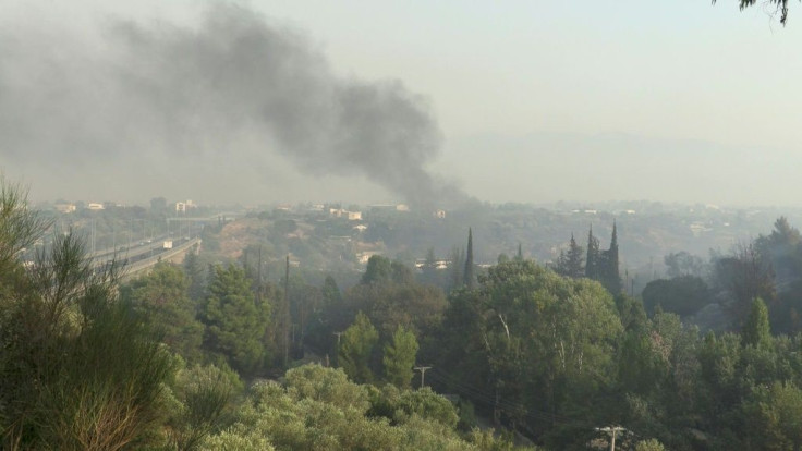 People on the outskirts of Athens are left to grapple with the devastation caused by forest fires