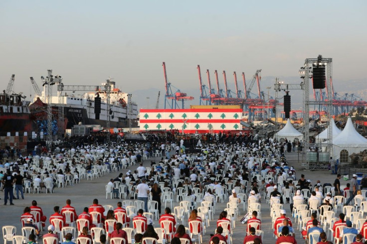 Maronite Christian Patriarch Bechara al-Raii (C) heads mass at the port of Lebanon's capital Beirut